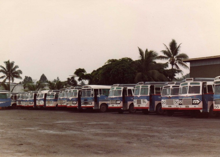 Line up at Shore Bus Ltd., depot just outside of Suva