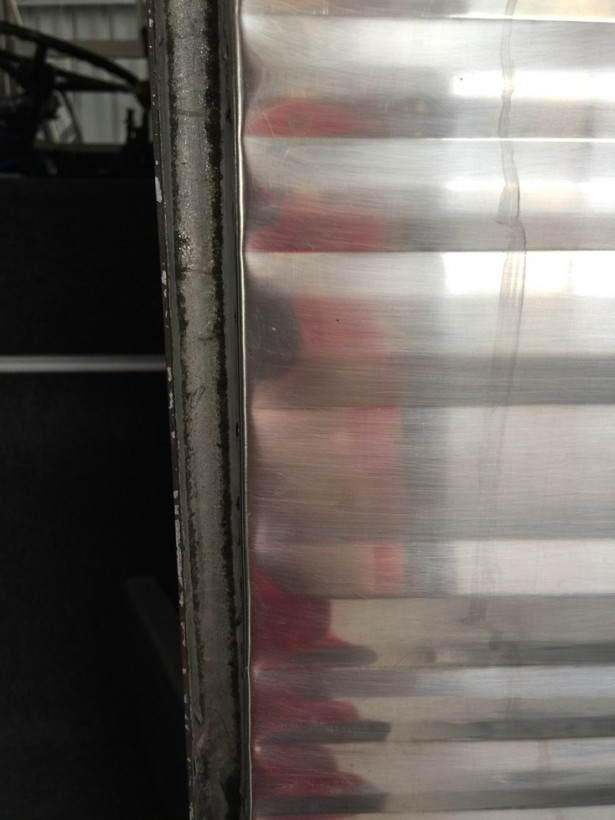 Photo of door frame on body of bus