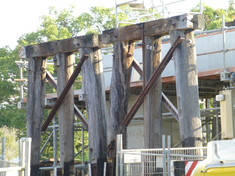Wooden supports still in place after the wooden bridge deck had been removed.
