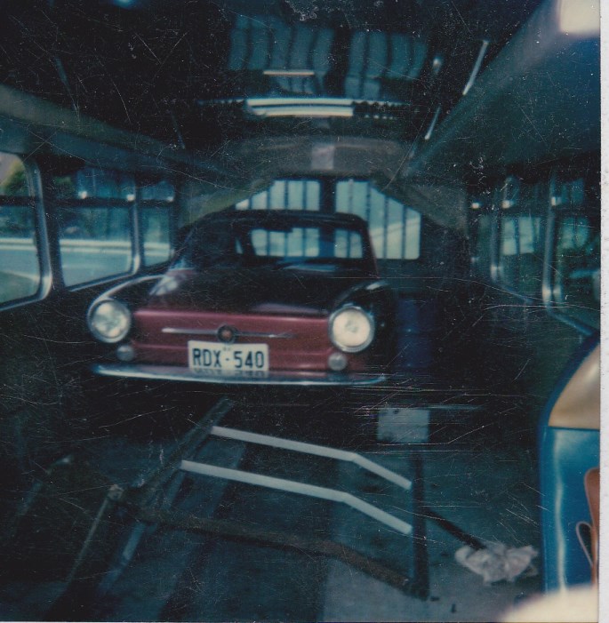 Ex TAA bus.Interior photo showing a Fiat parked inside.It was driven in.
