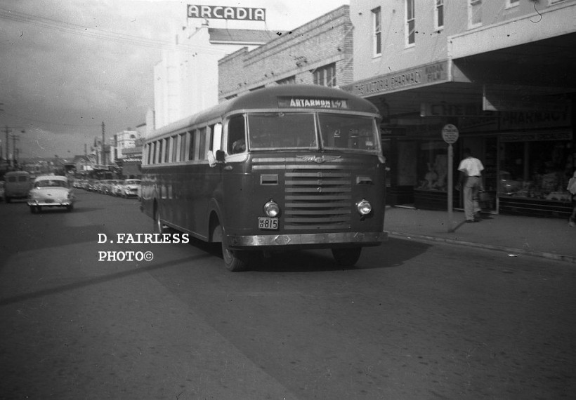 m/o 815 a 1950 Propert REO in Victoria Avenue Chatswood on 17/3/1959. It came from Deanne of Turramurra and was sold from Artarmon Red to Hunters Hill Bus Co. where it became m/o 4320. The Arcadia Theatre features prominently in the background and was one of three in Chatswood at the time, the others being the Esquire and the Kings. In the far background is the Chatswood Railway Station building.
