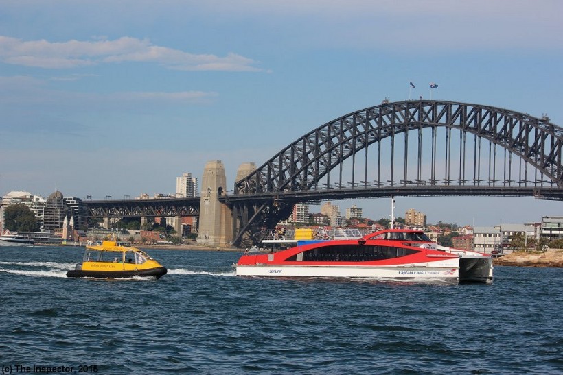 Violet McKenzie
Cook Cook Cruises ferry on Sydney Harbour 9/12/2015 together with a yellow water taxi.
Keywords: inspectorphoto ferries
