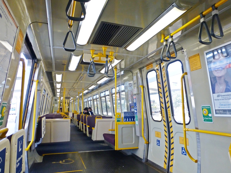 Interior of EMU 01 with yellow hand rails